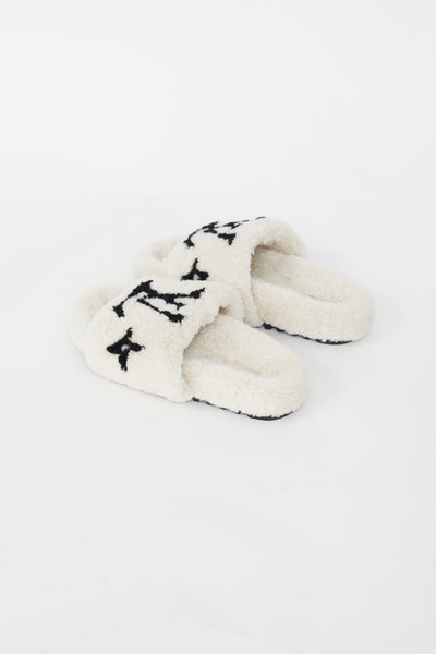 Louis Vuitton // White and Black Shearling Slide – VSP Consignment