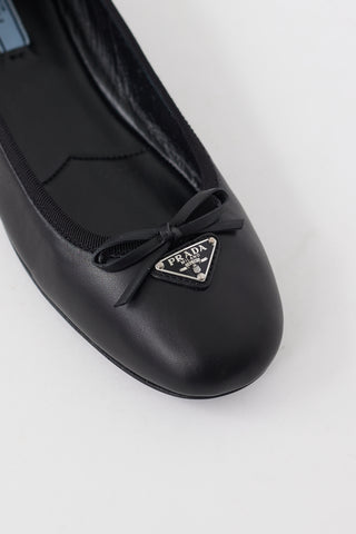 Prada Black Leather Triangle Logo Bow Flat