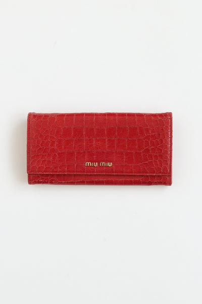 Miu Miu // Pink Embossed Flap Wallet – VSP Consignment