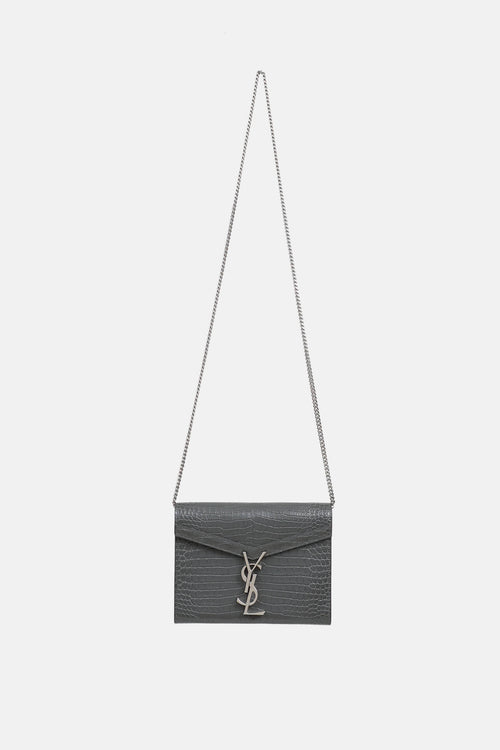 Saint Laurent Embossed Cassandre Clutch
