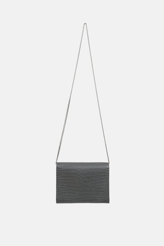 Saint Laurent Embossed Cassandre Clutch