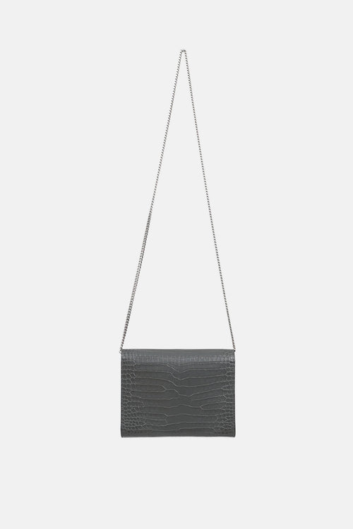 Saint Laurent Embossed Cassandre Clutch