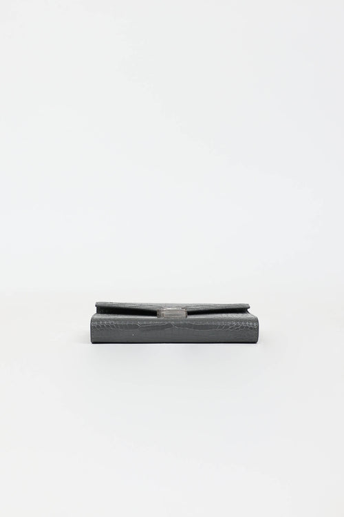 Saint Laurent Embossed Cassandre Clutch