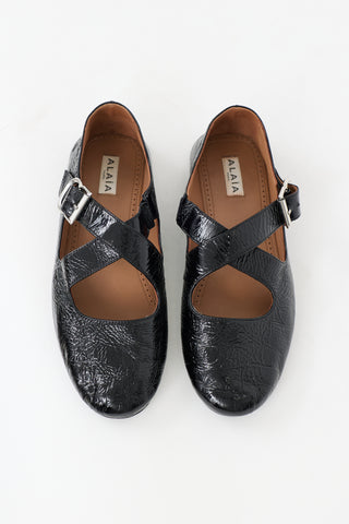 Alaïa Patent Crisscross Flat