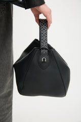Alaïa Leather Studded Top Handle Bag