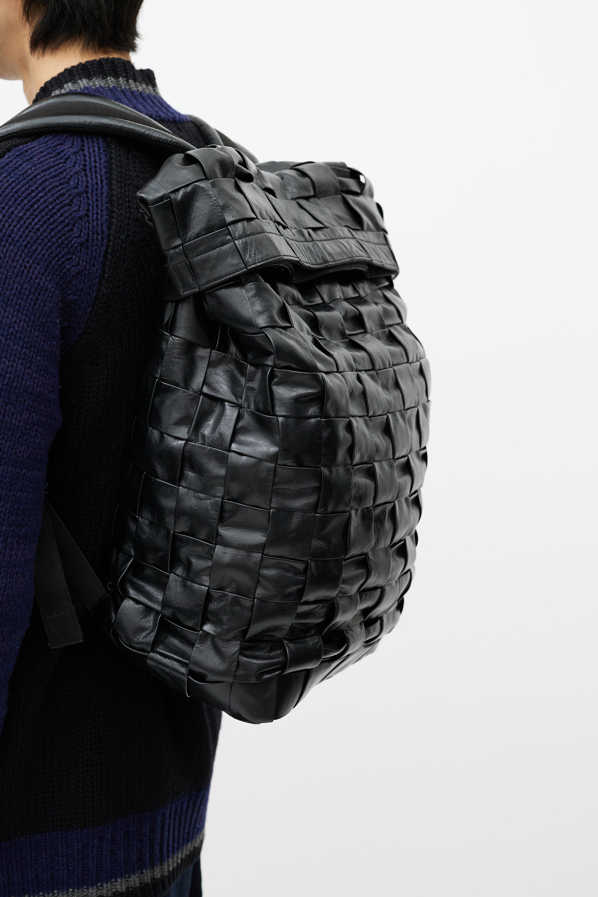 black leather fold over backpack Bottega Veneta // Black Cassette Intrecciato Leather Fold Over Backpack – VSP Consignment