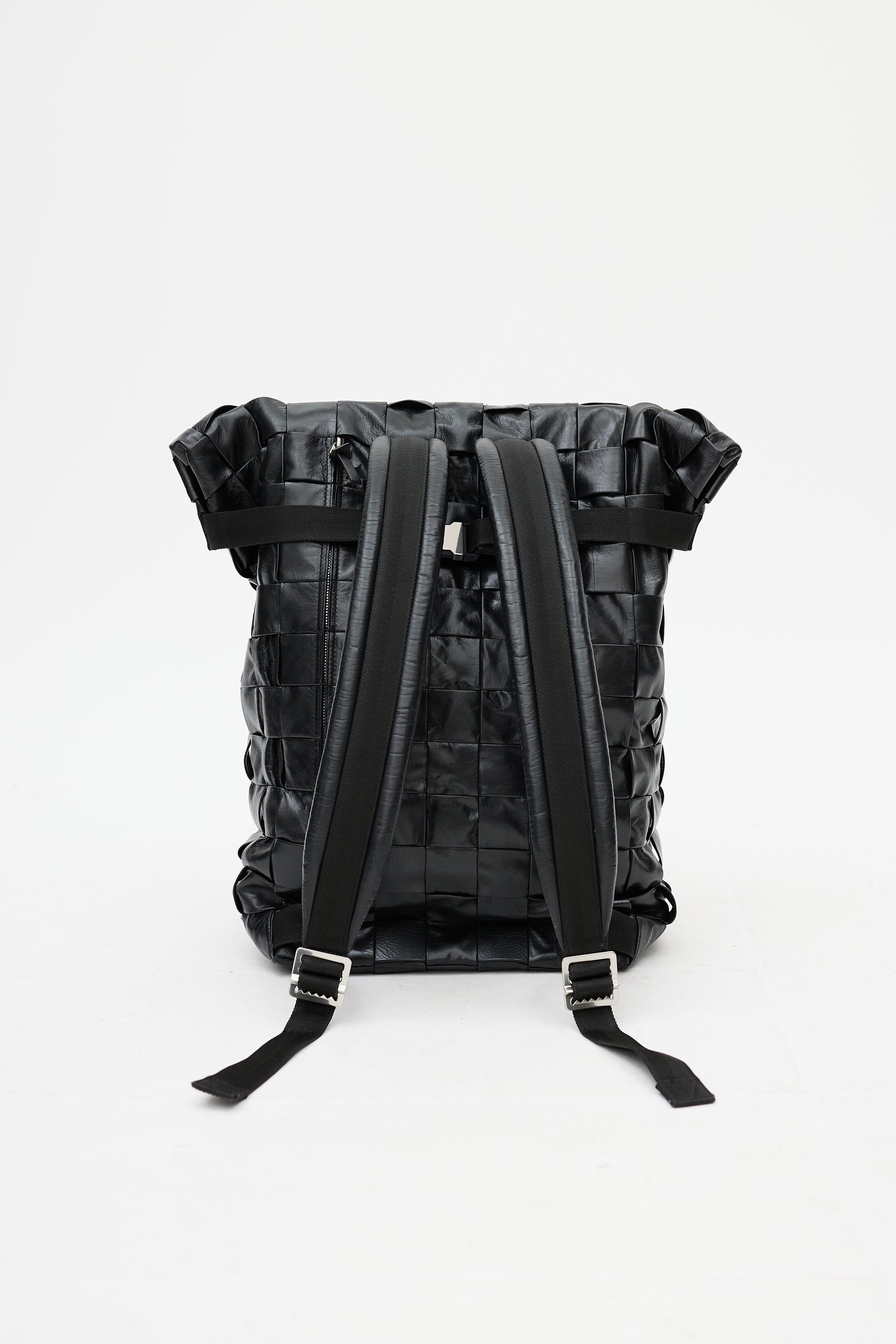 black leather fold over backpack Bottega Veneta // Black Cassette Intrecciato Leather Fold Over Backpack – VSP Consignment