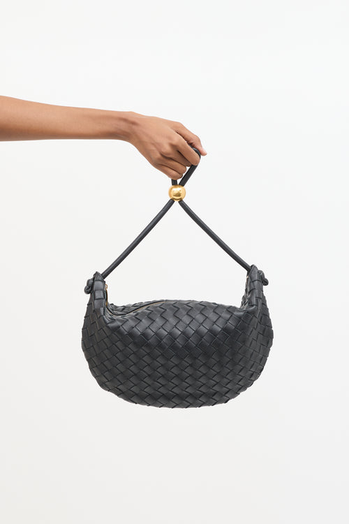 Bottega Veneta Leather Intrecciato Medium Turn Pouch Bag