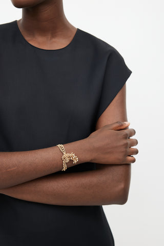 Louis Vuitton // Gold Crystal Dice Charm Bracelet – VSP Consignment