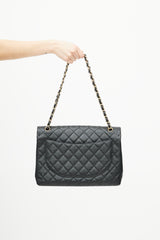 Chanel 2010 Black Jumbo Single Flap Leather Bag