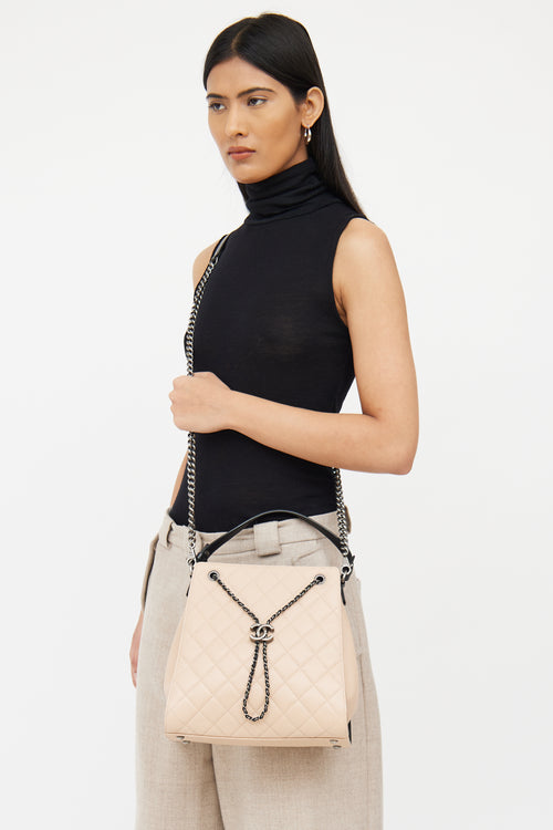 Chanel Beige & Black Caviar Quilted Bucket Bag