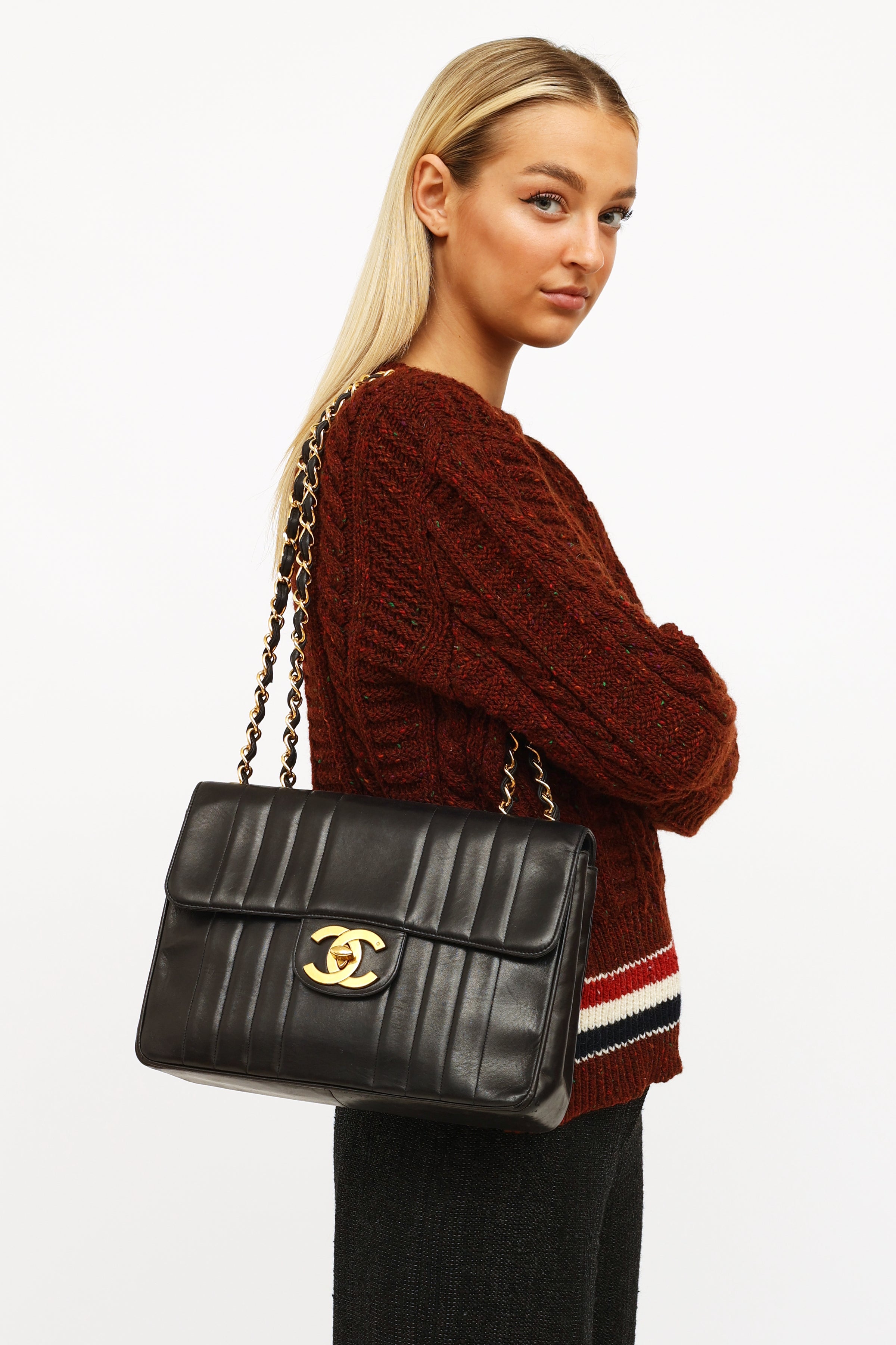 Chanel // Black Vertical Quilt Lambskin Flap Bag – VSP Consignment