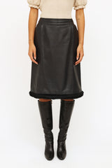 WornOnTV: Chanel's black leather jacket and tweed mini skirt on