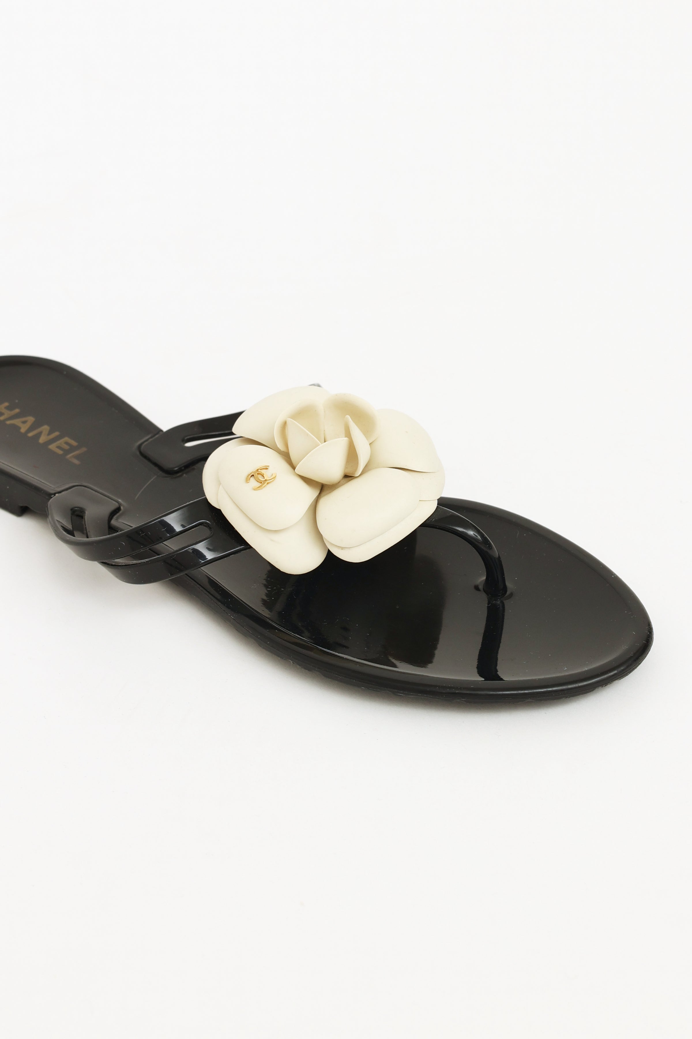 Chanel // Black & Cream Camelia Jelly Sandals – VSP Consignment