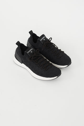 Chanel // Black & White CC Embossed Logo Sneaker – VSP Consignment
