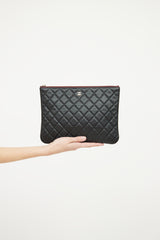 Chanel 2022 Black Quilted Caviar Medium O Case Pouch