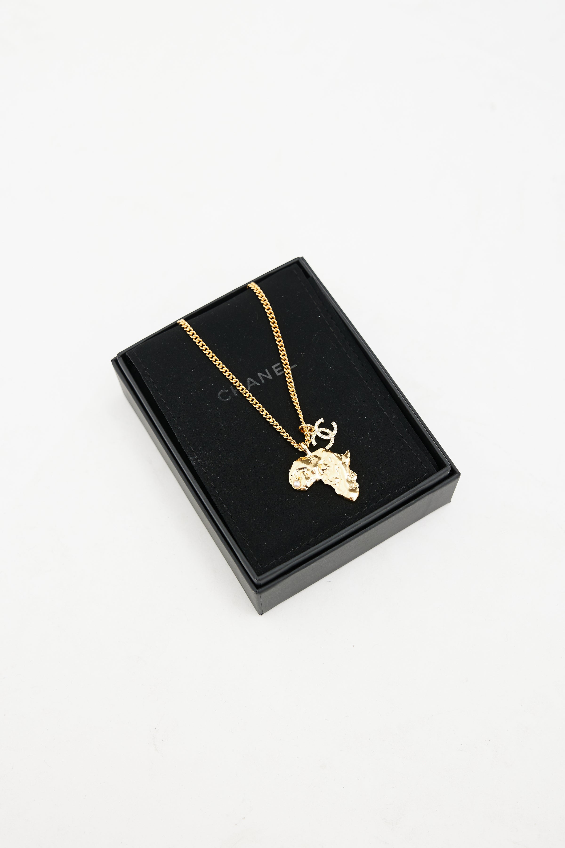 Chanel // Gold Africa CC Pendant Necklace – VSP Consignment