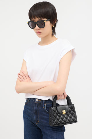 Chanel Quilted Leather Mini Kelly Bag