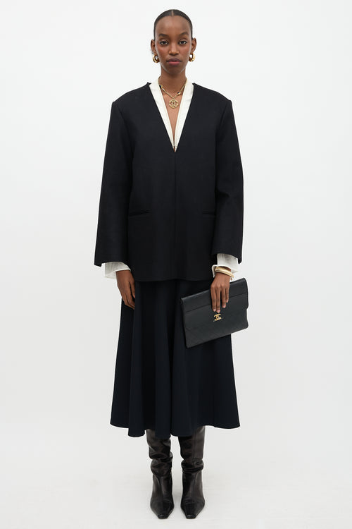 Chanel Leather Sleek and Chic  Clutch