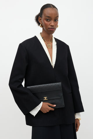 Chanel Leather Sleek and Chic  Clutch
