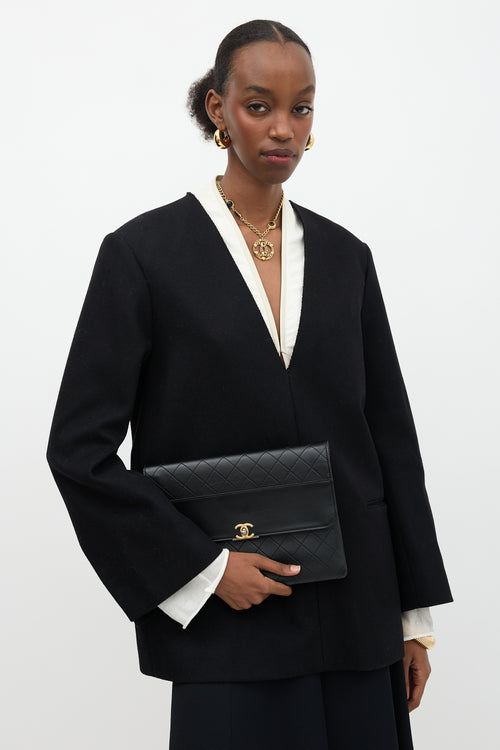 Chanel Leather Sleek and Chic  Clutch