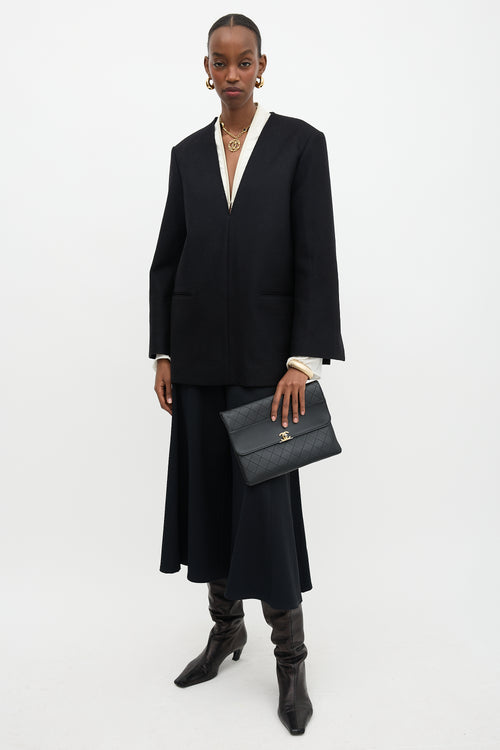 Chanel Leather Sleek and Chic  Clutch