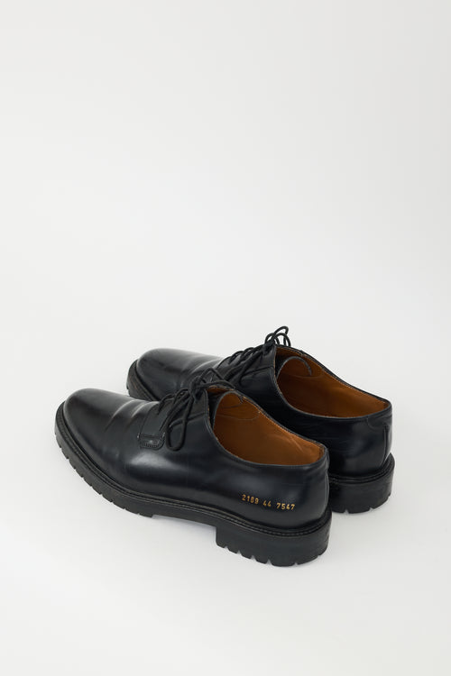 Common Projects Black Leather Lug Sole Derby