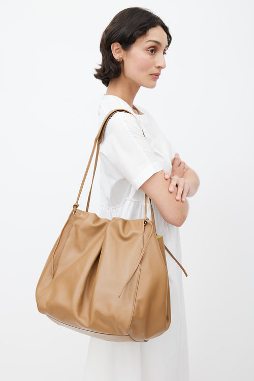 Dries Van Noten // Brown Leather Bucket Bag – VSP Consignment