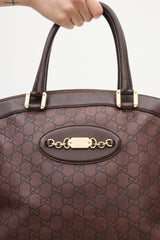 Gucci Brown Leather Monogram Embossed Bag