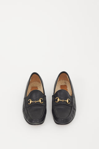 Gucci Black & Gold Shearling Loafer
