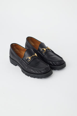 Gucci Black Leather & Gold Hardware Lug Loafer