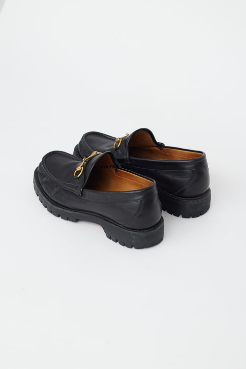 Gucci Black Leather & Gold Hardware Lug Loafer
