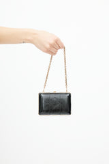 Gucci Black & Gold Leather Clutch
