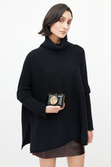 Gucci Black & Gold Leather Clutch