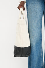Gucci Canvas Embossed Logo Tote Bag