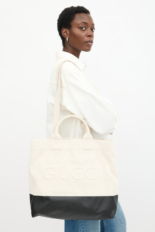 Gucci Canvas Embossed Logo Tote Bag