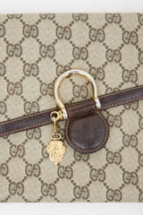 Gucci GG Supreme Clutch