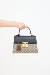 GG Supreme Monogram Padlock Bag