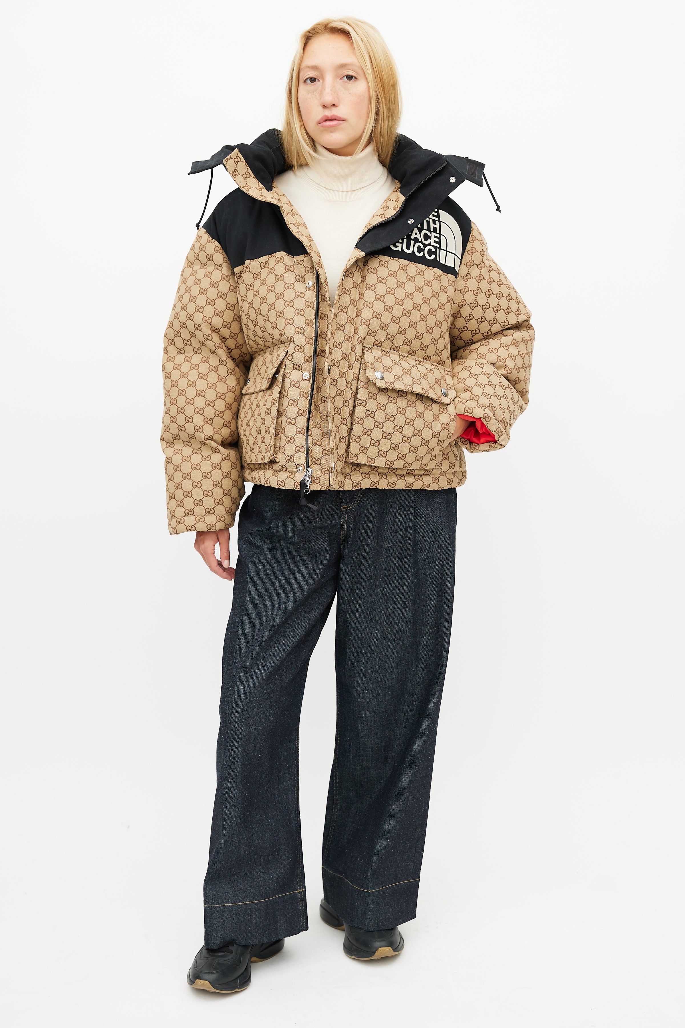 The North Face x Gucci down jacket in ivory and black