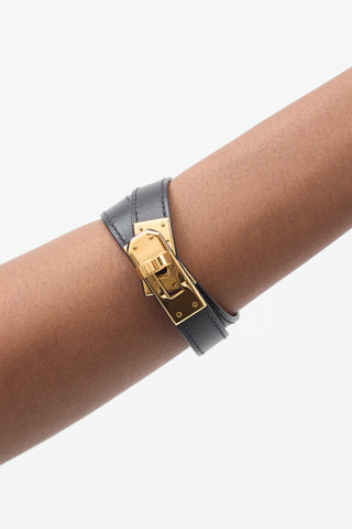 Hermès 2003 Black & Yellow Gold Leather Kelly Double Tour Bracelet