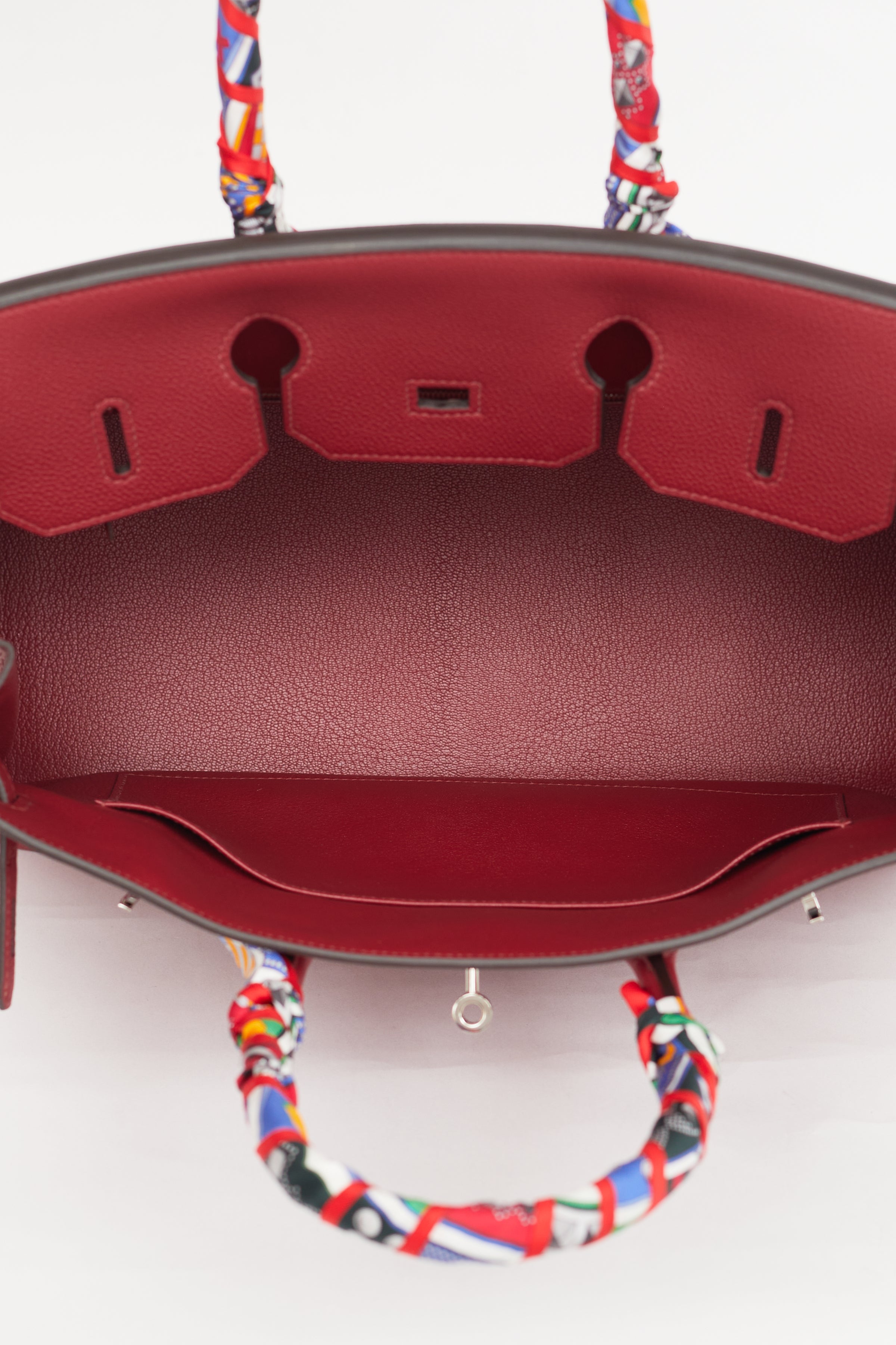 Meet the Rouge Grenat Birkin! This iconic bag is in the color red