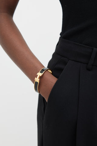 Hermès Black & Gold Clic H Bracelet