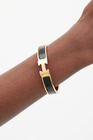 Hermès Black & Gold Clic H Bracelet