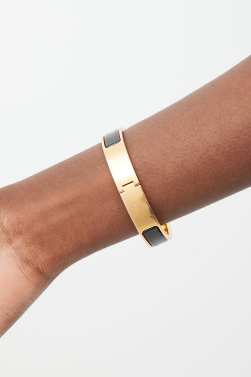 Hermès Black & Gold Clic H Bracelet