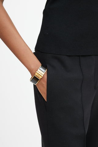 Hermès Black & Gold Hinged Bracelet