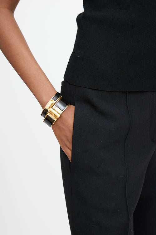 Hermès Black & Gold Hinged Bracelet