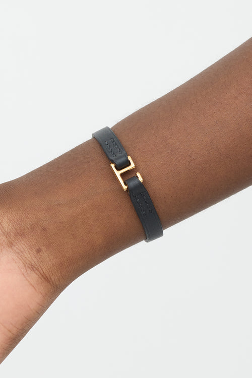 Hermès Black & Yellow Gold Leather Rivale Bracelet