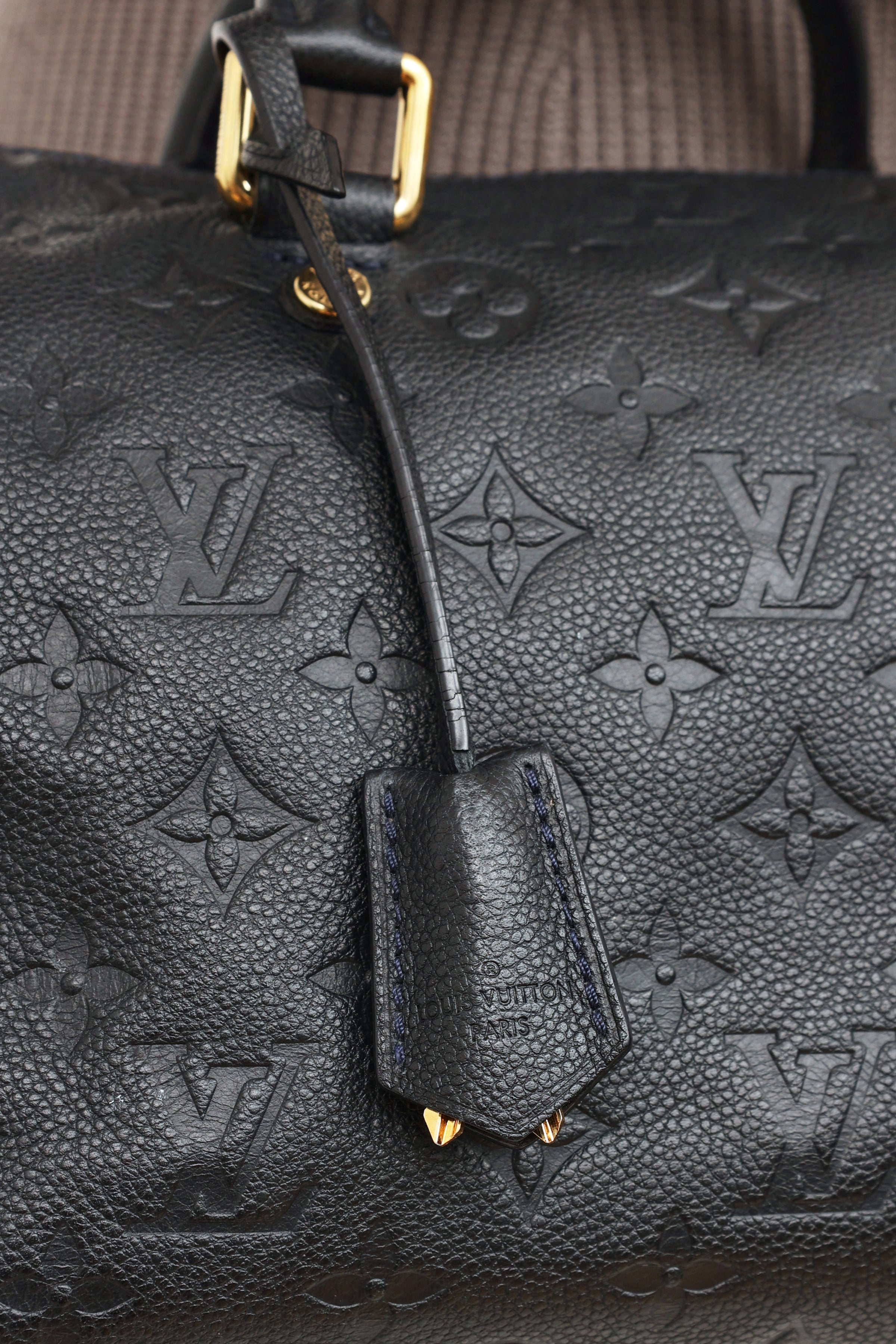 Sold at Auction: Louis Vuitton Empreinte Navy Blue Speedy Bandouliere Bag