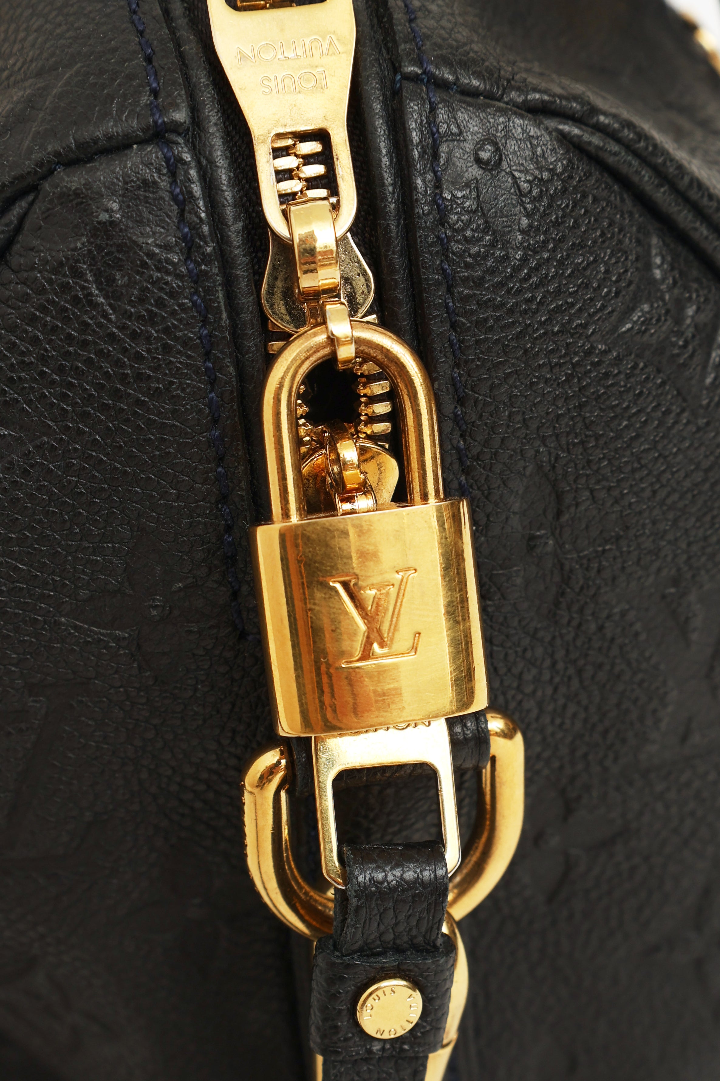 Louis Vuitton // Navy Empreinte Speedy Bandouliere 25 Bag – VSP Consignment