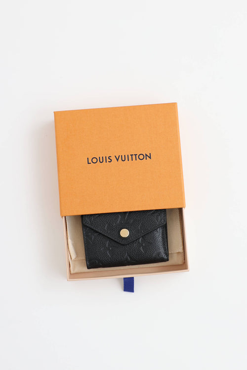 Louis Vuitton Empreinte Zoe Tri-Fold Wallet
